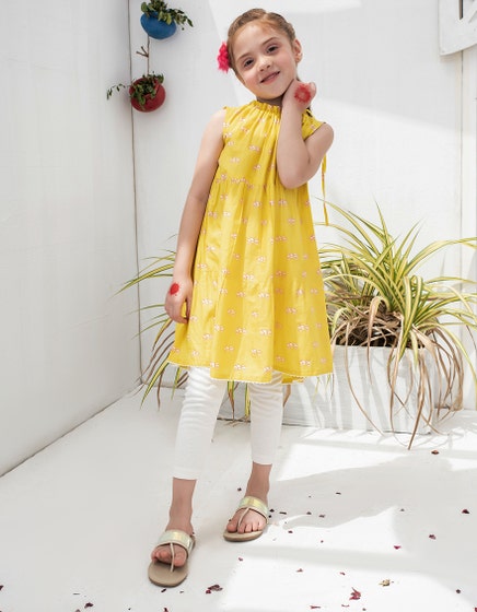 j. 01 pc stitch kurti girls / yellow